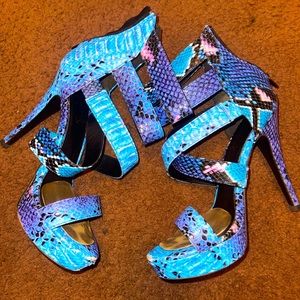 Size 9. Faux snakeskin, 5inch well lived in Charlotte Russe heels.